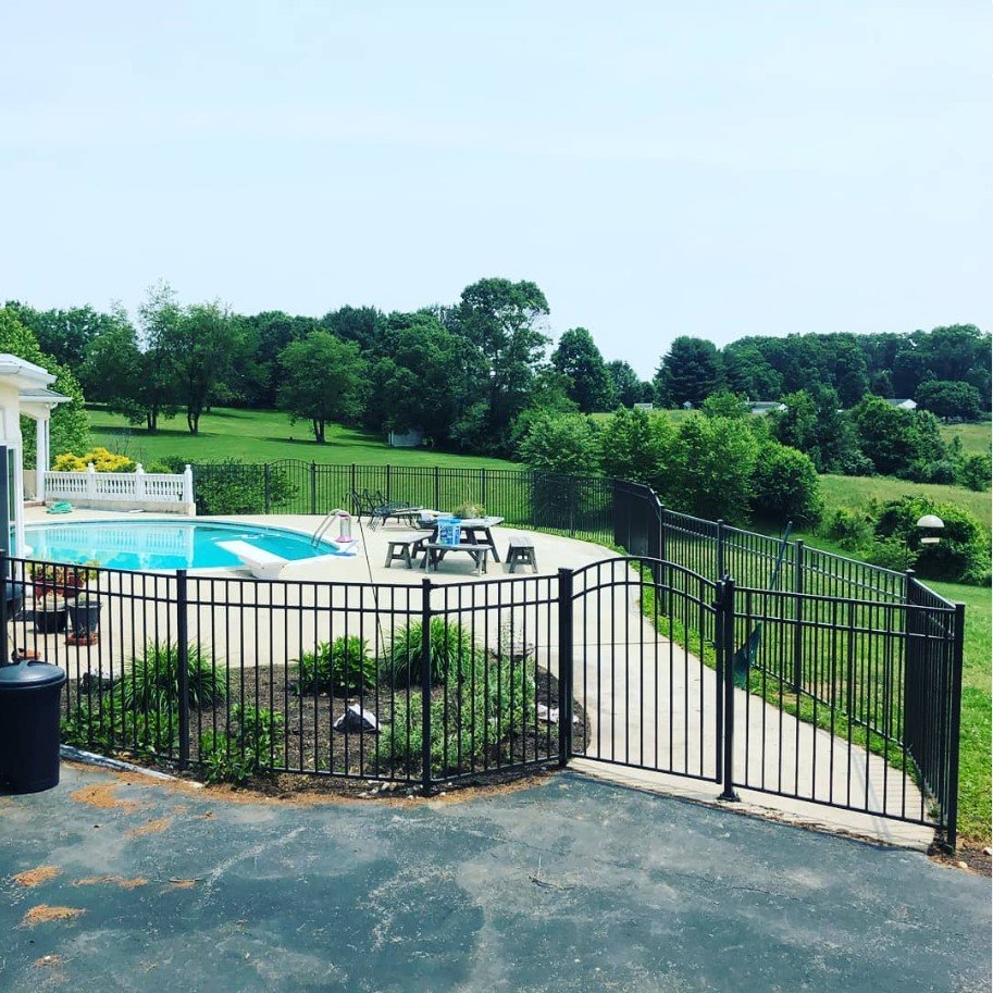 Aluminum fence around pool.