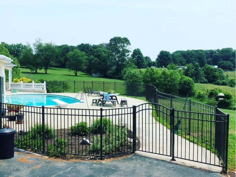 Aluminum fence around pool.